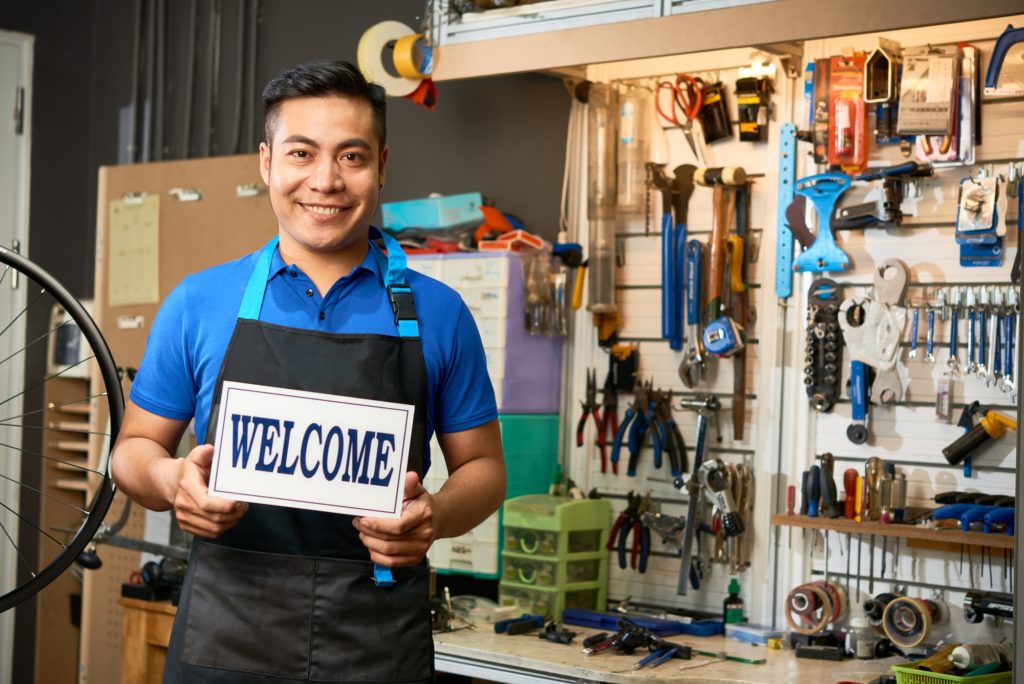 Mechanic Welcoming Customers